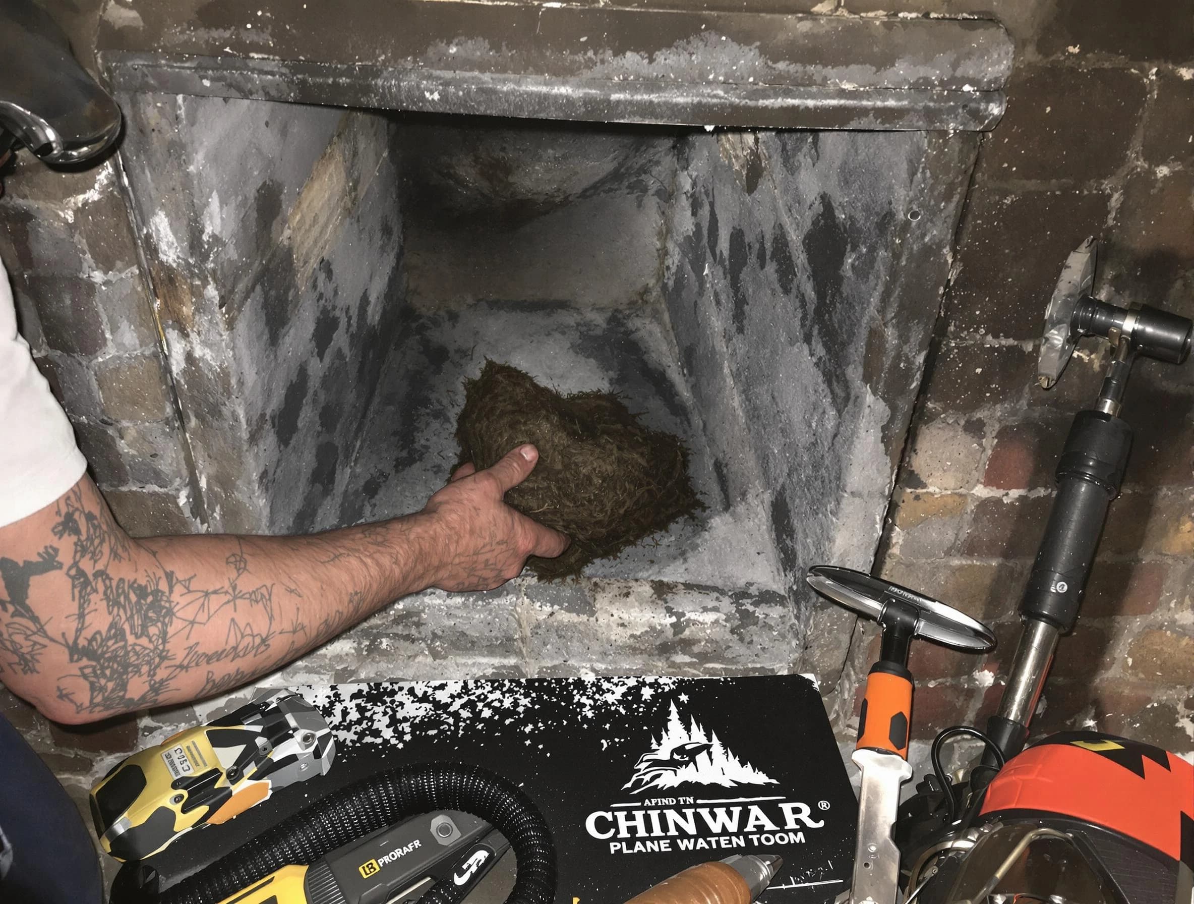 Provo Chimney Sweep safely removing debris and screening chimney in Provo, UT
